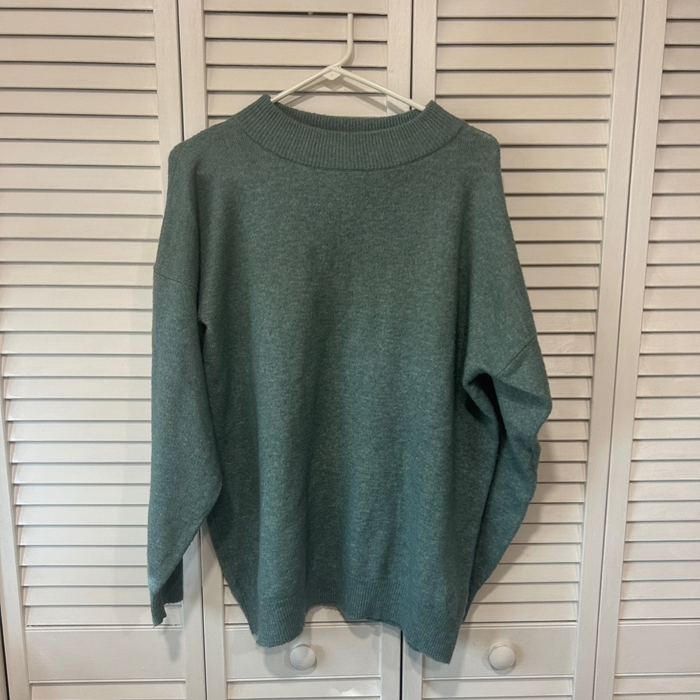 A New Day sweater